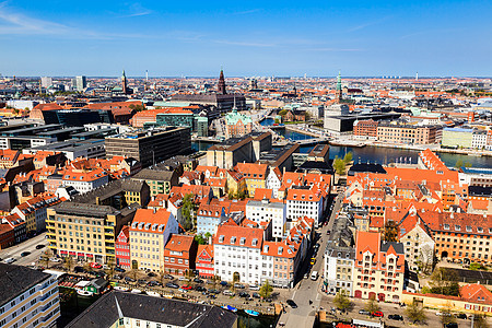 丹麦哥本哈根屋顶和运河空中观察 丹麦哥本哈根银行运河街道游客建筑大教堂文化房子蓝色娱乐图片