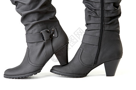 2名女性黑靴女士高跟鞋白色脚跟皮革衣服齿轮靴子黑色图片