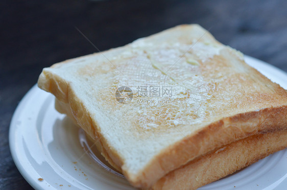 美味面包盘子黄油甜点小吃糖果食物饮食生活奶油营养图片