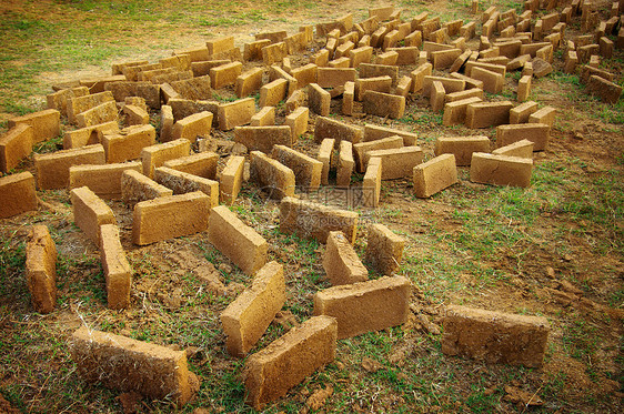 建造粘土房屋的克莱砖黏土智力民间民俗农村地面手工图片