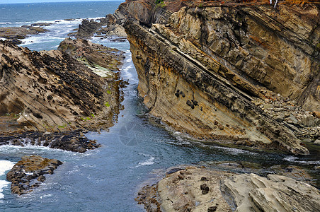 俄勒冈州海岸线海洋波浪潮汐风景公园蓝色海岸海滩岩石图片