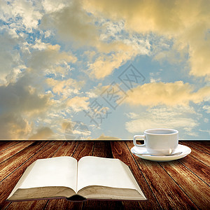 开放书本和喝咖啡 放松概念图片