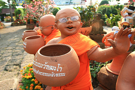 佛像微笑橙子冥想宗教雕塑棕色寺庙男人艺术佛教徒图片