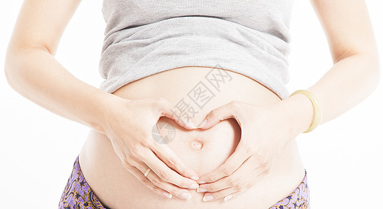 肚子怀孕 妈妈用手做心脏形状的妈妈图片