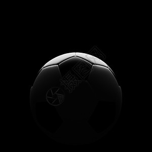 黑色的足球球和漂亮的背光照明图片