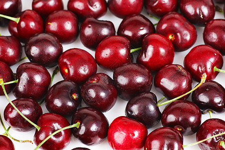 樱桃背景水滴白色宏观食物营养李子团体红色饮食水果图片