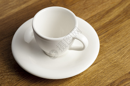 咖啡杯茶托白色杯子咖啡店桌子背景图片