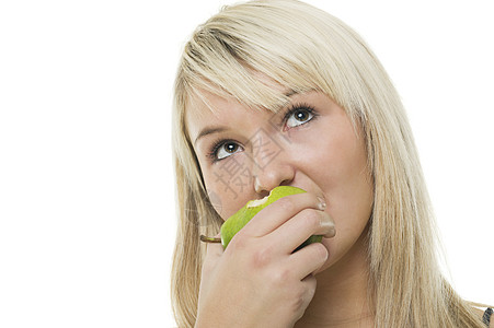 妇女吃着绿苹果图片