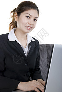 亚裔商业妇女女性套装专注工作办公室网络电脑管理人员商务顾问图片