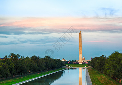 日落在华盛顿纪念碑的反光城市建筑学反射池直流电旅游池塘历史性地标天空公园图片