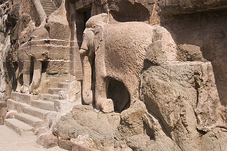 古代岩石雕刻大象剂背景图片