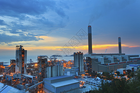 日落时香港的发电厂资源力量化学场地车站石油变压器商业桅杆设施背景图片
