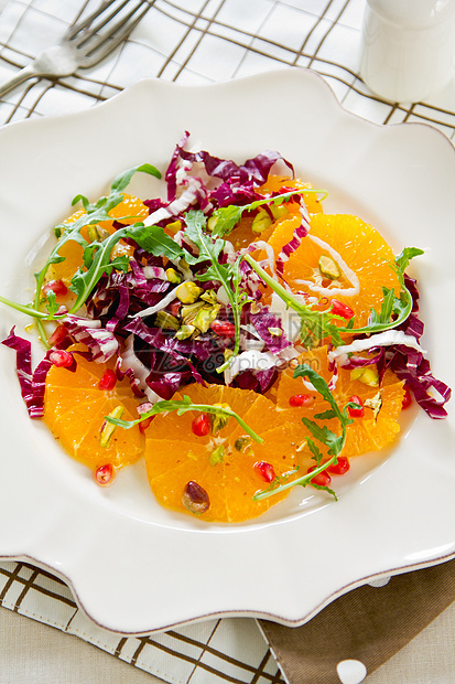 橙色拉迪奇奥沙拉和石榴沙拉饮食绿色火箭沙拉蔬菜营养健康开心果红色水果图片