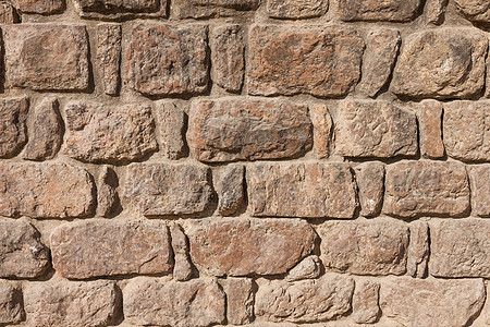 石制壁纹理背景棕色石头宏观花岗岩工作砂浆石方臀部构造材料图片