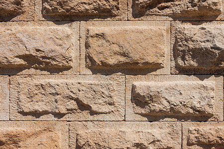 远古墙纹理背景砂岩建造花岗岩棕色材料工作石工石匠石板栅栏图片