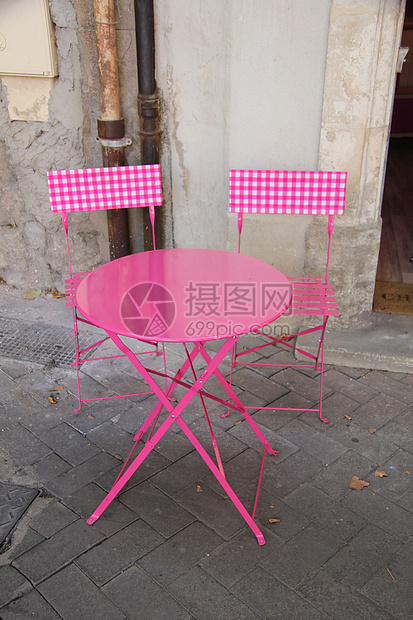 表格和椅子小吃咖啡小酒馆粉色桌子晚餐用餐餐厅午餐图片
