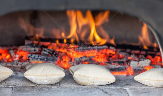 小面包糕点壁炉烹饪柴火鞋垫余烬小吃烤箱食物面团图片