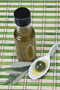 竹垫上处女橄榄油小吃农业营养食物素食沙拉瓶子蔬菜玻璃饮食图片