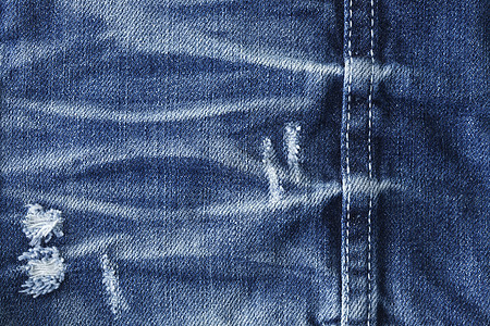 蓝色牛仔裤的前线细节服装裤子宏观材料牛仔布织物衣服棉布纺织品图片