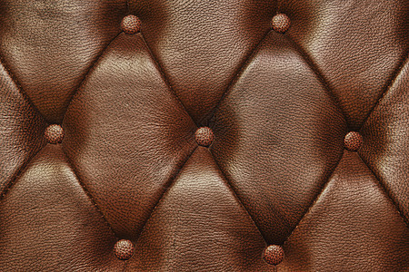棕色皮革铆钉速度召集菱形图片