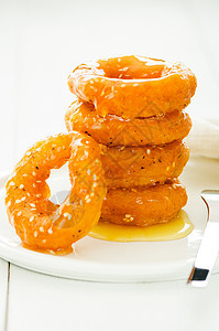微型甜甜甜圈橙子芝麻食物甜甜圈包子圆圈戒指甜点蛋糕摊位图片