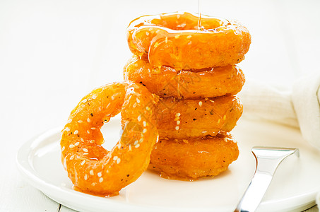 微型甜甜甜圈芝麻蛋糕蜂蜜圆圈甜甜圈食物戒指周报工作室橙子图片