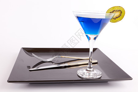 蓝饮料液体酒精刀叉派对酒杯玻璃文本美食奢华奇异果图片