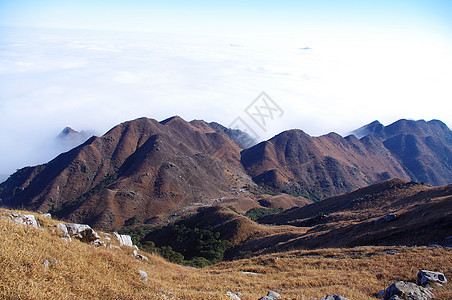 彩云环绕着中国的中华人Xizang山脊青金石远景山腰地貌山顶热带景点爬坡岩石山坡图片