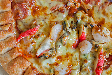 生海鲜海食披萨烹饪脆皮螃蟹海鲜香肠餐厅美食蔬菜育肥金属背景