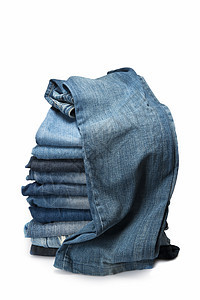 白色背景的蓝色牛仔裤堆叠店铺青少年接缝服装海军团体裤子休闲裤销售购物图片