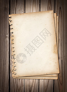 褐色木质纸上的旧便记纸图片