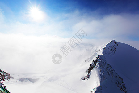 平面顶部冰川高山远足运动阳光全景暴风雪爬坡岩石太阳图片