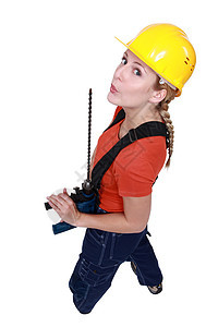 有钻孔的妇女建造工匠黄色员工技术专业石匠劳动工艺权限图片