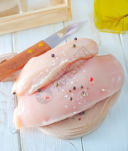 鸡肌肉木板鱼片食物砧板胡椒正方形木头洋葱动物图片