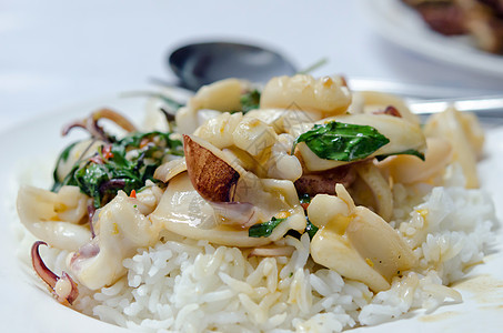 亚洲食物乌贼盘子章鱼海鲜胡椒油炸蔬菜图片