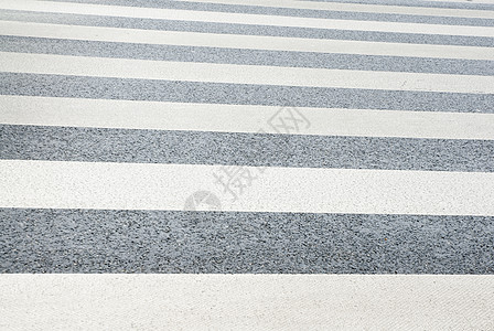 斑马卫士十字路口行人交通白色运输条纹人行道鹅卵石城市安全路面图片