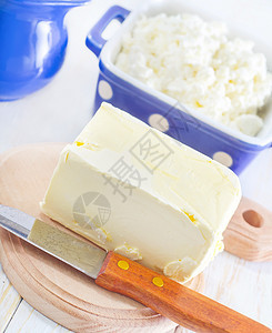 黄油 牛奶和小屋生活奶油奶制品玻璃饮食瓶子木板水壶叶子桌布图片