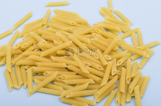 未烹煮的意大利面粉日食细绳贝壳团体白色硬粒主食面条黄色食物收藏图片