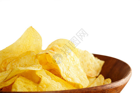 Crisps 特写黄色小吃白色芯片盐渍午餐油炸营养土豆食物图片