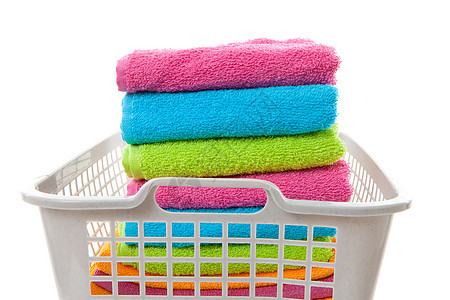 装满彩色折叠毛巾的洗衣篮篮子亚麻织物家务什锦洗衣店图片