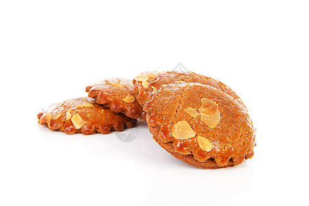 典型荷兰填充的姜饼饼干皮箱窥镜糕点蛋糕糖果圆形食物杏仁图片