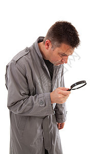 穿雨衣的人 看见放大镜罩灰色玻璃工作室警察侦探背景图片