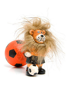 橙色足球球和狮子竞赛运动锦标赛游戏圆形橙子雕像图片