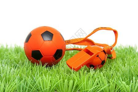 橙色足球球和长笛图片