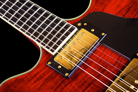 红电吉他木头音乐岩石金子低音脖子蓝调线圈音乐家照片图片