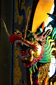 龙头雕像雕塑艺术动物建筑学金子寺庙传统宗教装饰品文化图片