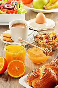 早餐 包括咖啡 面包 蜂蜜 橙汁 梅斯利a健康盘子桌子坚果牛奶橙子均衡水果杯子果汁图片