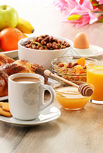 早餐 包括咖啡 面包 蜂蜜 橙汁 梅斯利a厨房粮食橙子牛奶杯子均衡果汁健康种子盘子图片