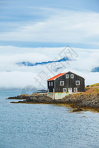 冰岛美丽的风景草地海洋房子场地干草峡湾爬坡奶制品海岸线海岸图片