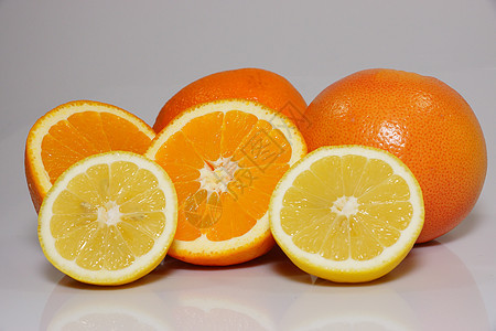 橙 柠檬和葡萄宏观柚子橙子热带水果照片团体工作室食物叶子图片
